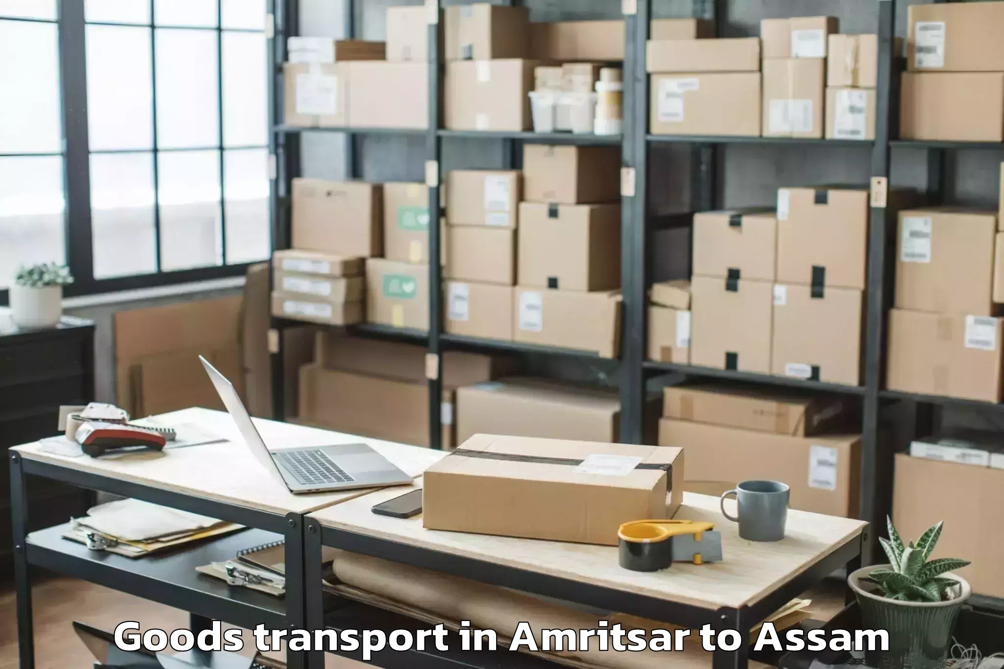 Book Amritsar to Pachim Nalbari Goods Transport Online